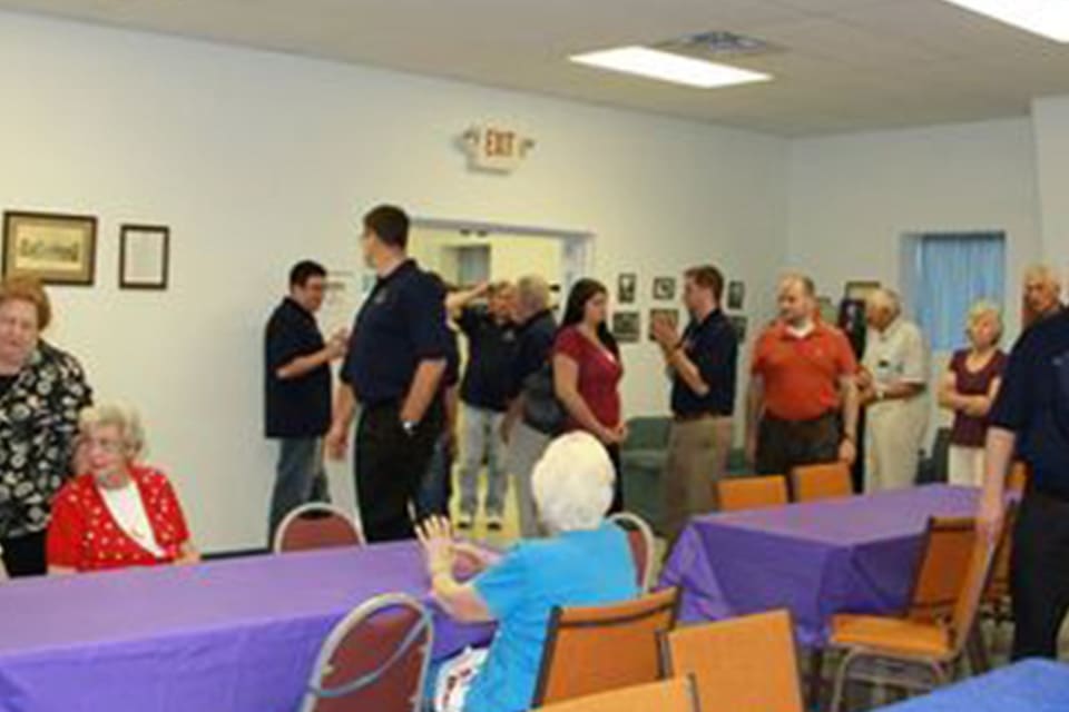 Group of people gathered for a meeting.